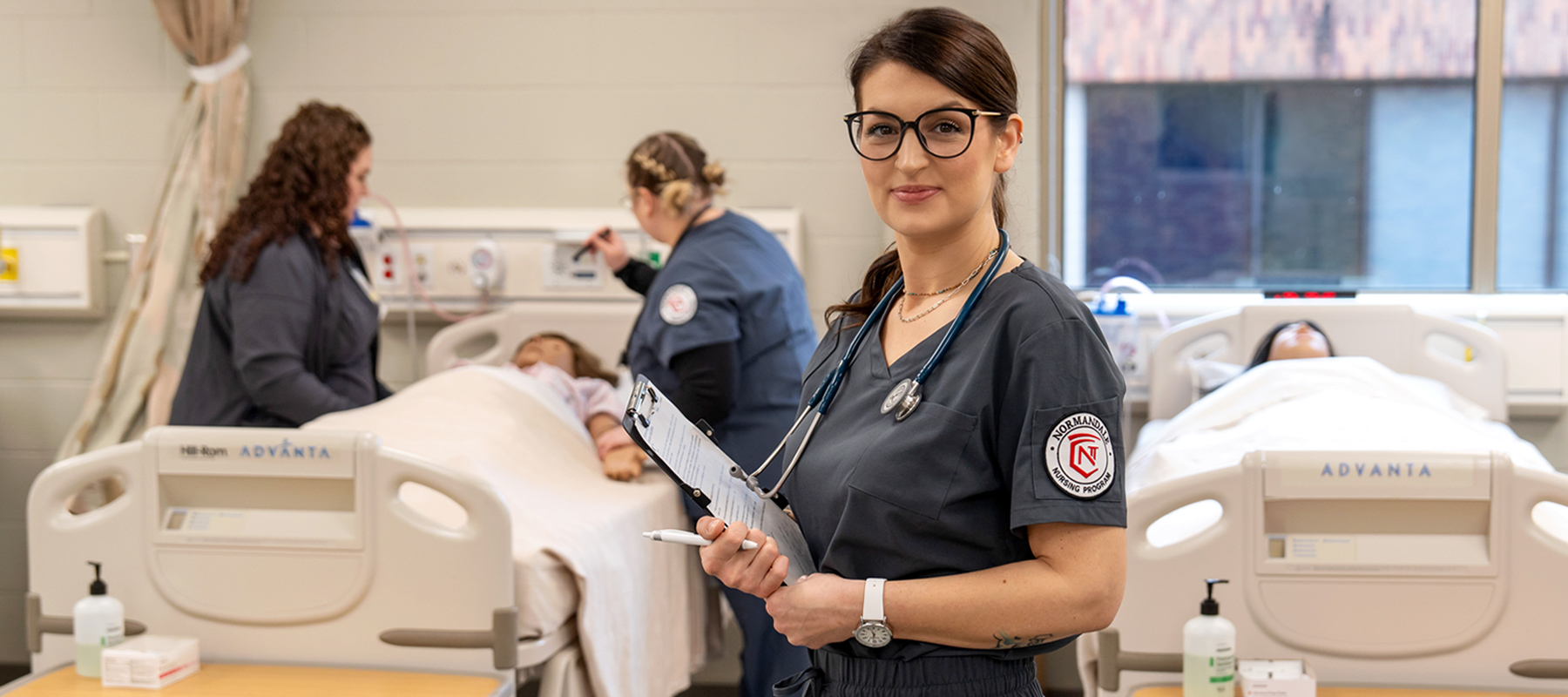 Normandale nursing students working in clinical setting